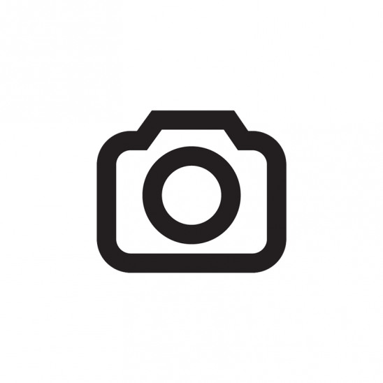 center island used for gift wrap island and simple projects as well as large food prep and catering during parties, needs sink and extra appliances, sliding glass cabinets are nice as well on one wall. more counter space needed and windows if positioned on window side